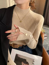 Beige ribbed women's sweater with button accents