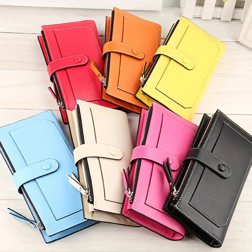 Women's PU leather bifold long wallets in assorted soft pastel colors with buckle closure and zippered compartments, ideal for card organization.