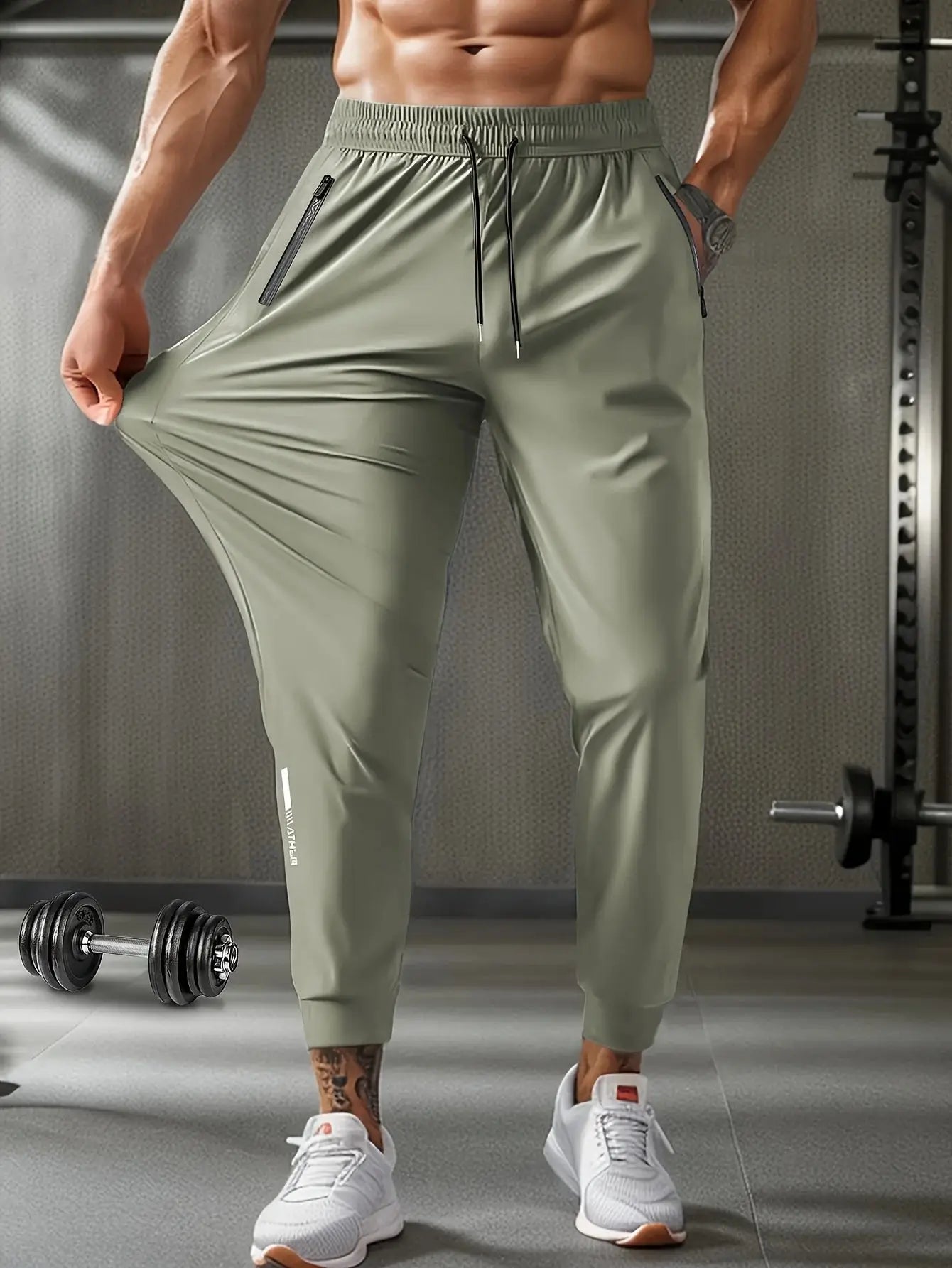 Mens Quick-Dry Training Pants in olive green with elastic waist, drawstring, and zipper pockets, ideal for gym and outdoor sportswear.