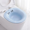 Light blue toilet seat Sitz bath for personal hygiene.