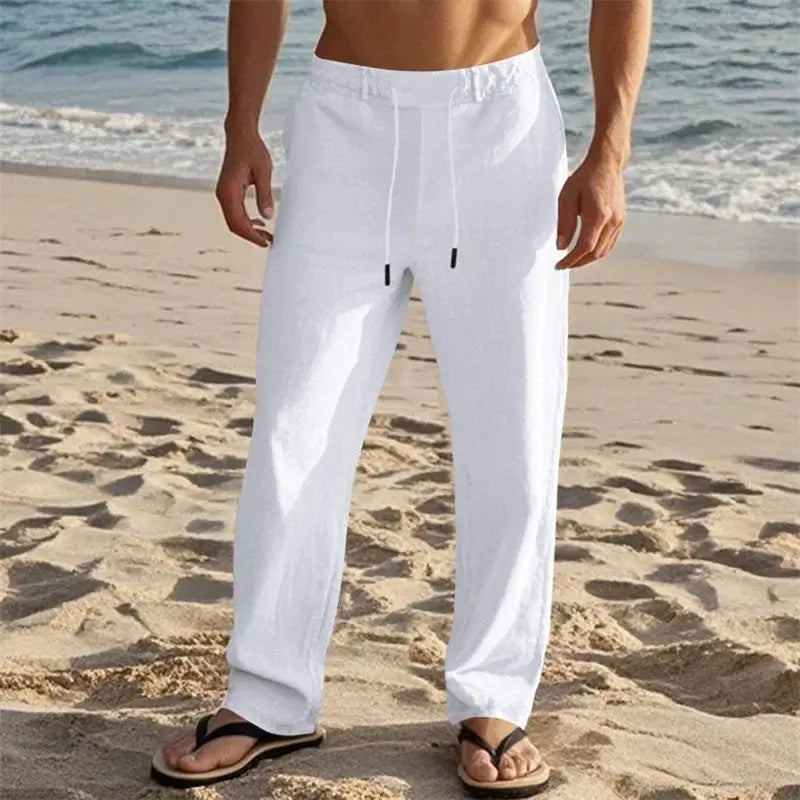 Men's lightweight linen pants with drawstring and pockets in white, ideal for beach and casual summer wear with a straight-leg fit.