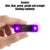 Hand holding mini solar LED light, five colors