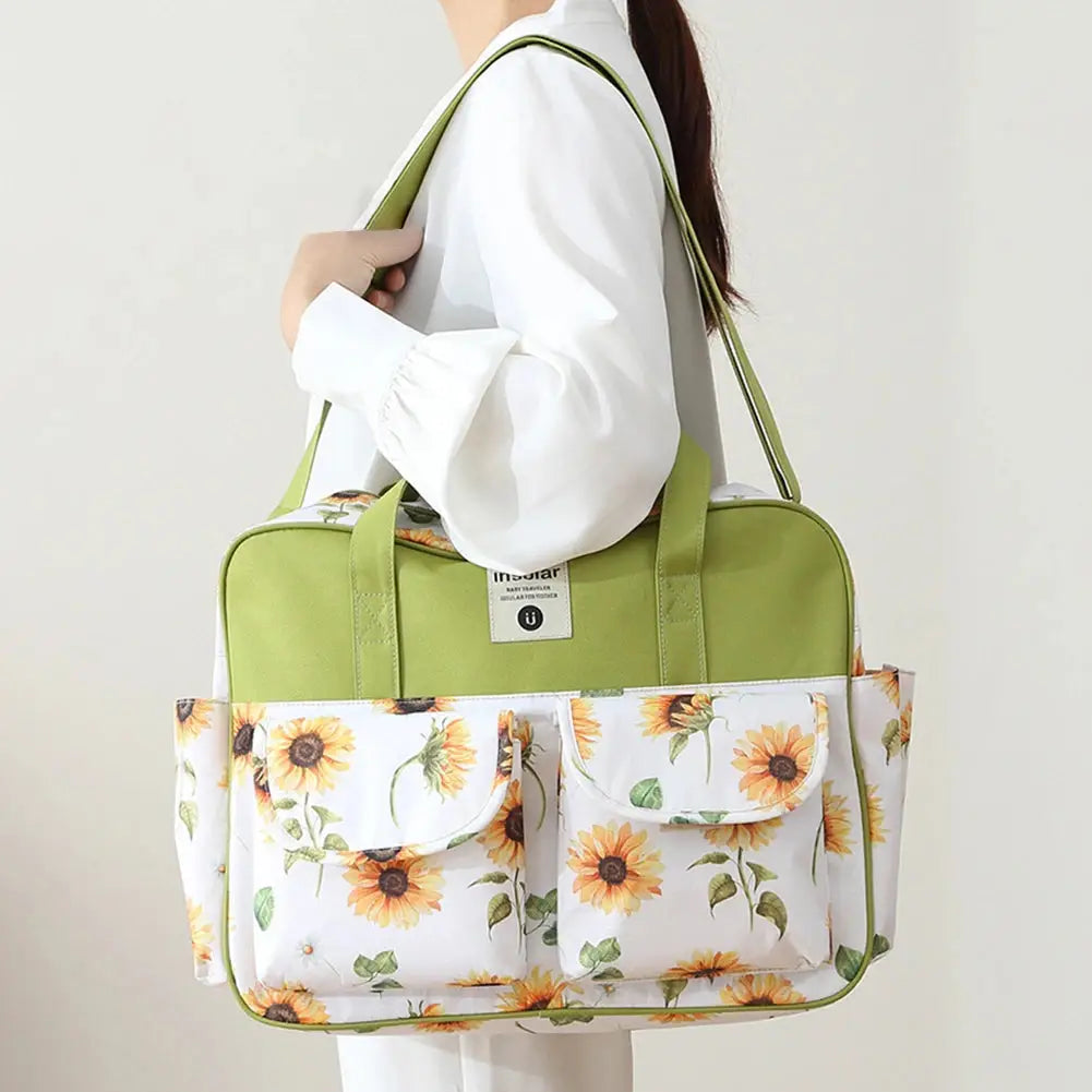 Waterproof maternity stroller bag with large capacity, lightweight shoulder design, ideal for travel and daily use