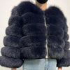 Dark gray faux fur coat worn by model