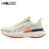 Beige cushioned running shoe with orange sole