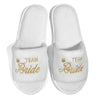 White slippers with gold 'Team Bride' embroidery