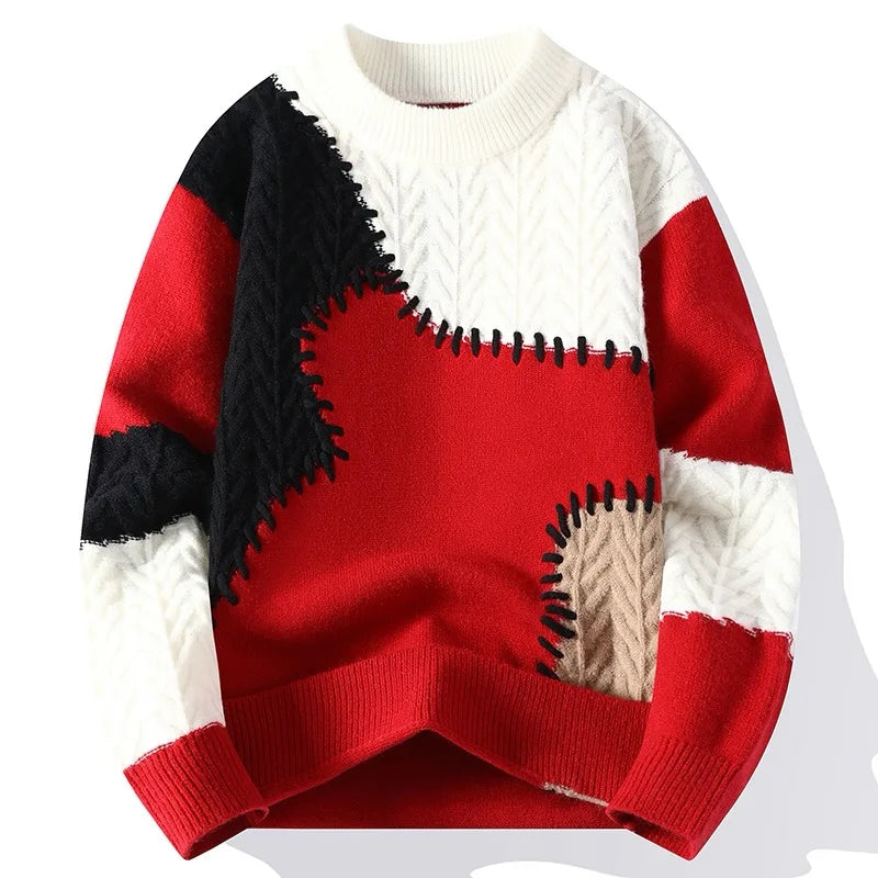 Men's winter fashion sweater in red, black, and white patchwork design.