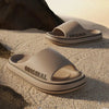 Beige original slide sandals on sand