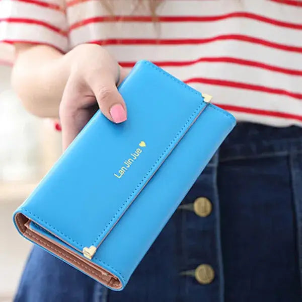 Sky blue Women's Long PU Leather Trifold Wallet with gold heart accents, compact and stylish for everyday use.