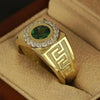 Classic gold-colored men's ring with green gemstone