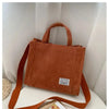 Orange women's corduroy bag with handles and strap