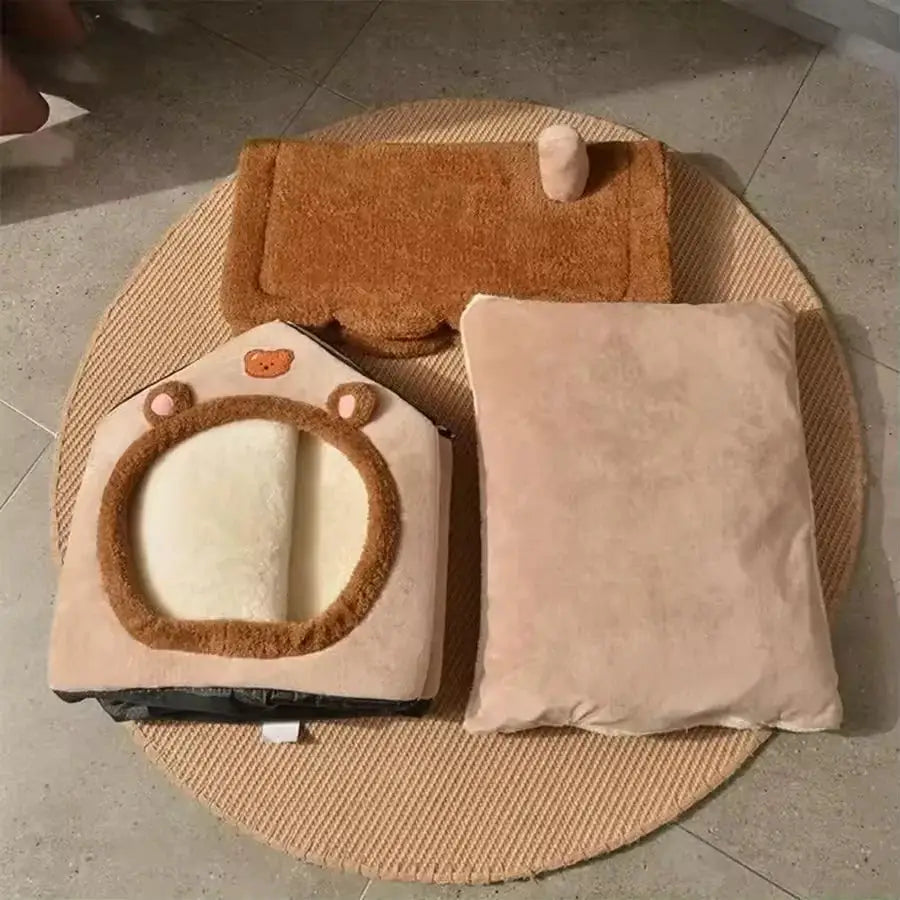 Disassembled foldable pet bed house showing removable roof, cushion, and fleece walls for easy washing and storage