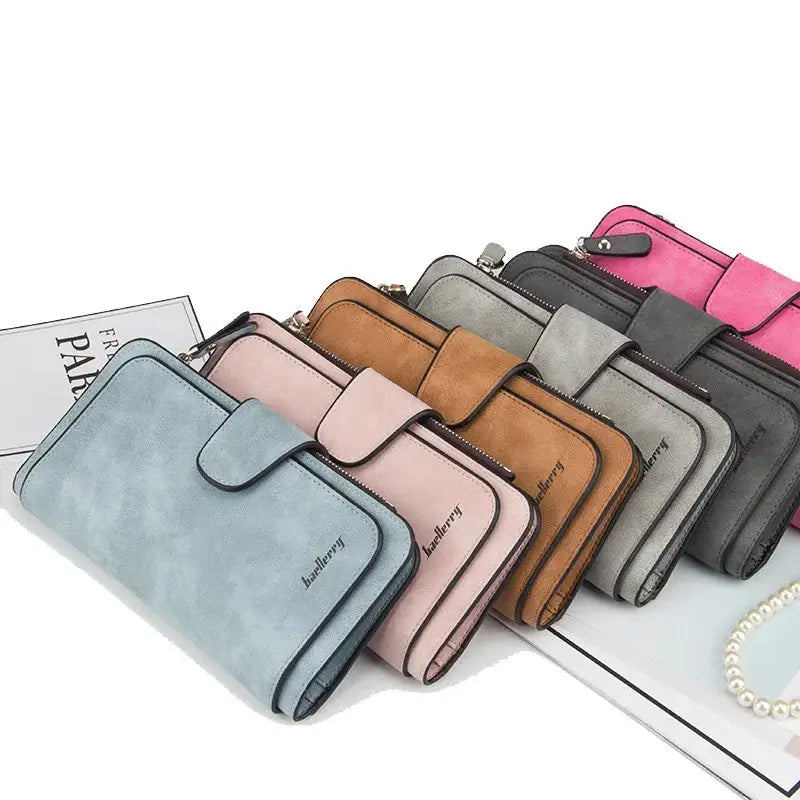 Assorted colors of women's long trifold wallets with large capacity and secure snap closure, perfect as an organizer clutch.
