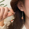 Christmas gift and Santa face earrings