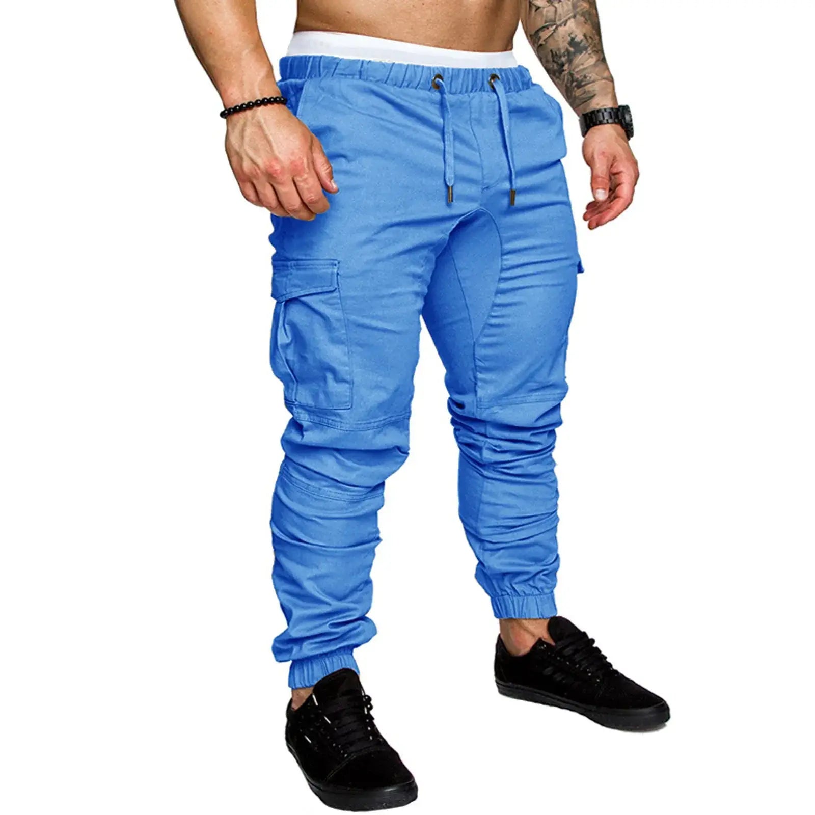 Bright blue men’s drawstring skinny cargo pants with ankle cuffs and side pockets, perfect for casual and sporty looks.