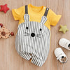 Striped baby jumpsuit with mouse design on wooden floor