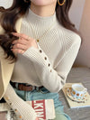 Cream ribbed women's sweater with button details