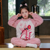 Pink star-themed pajama set for kids, cozy winter wear