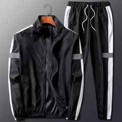 Black men's 2-piece tracksuit set with white side stripes and gray details.