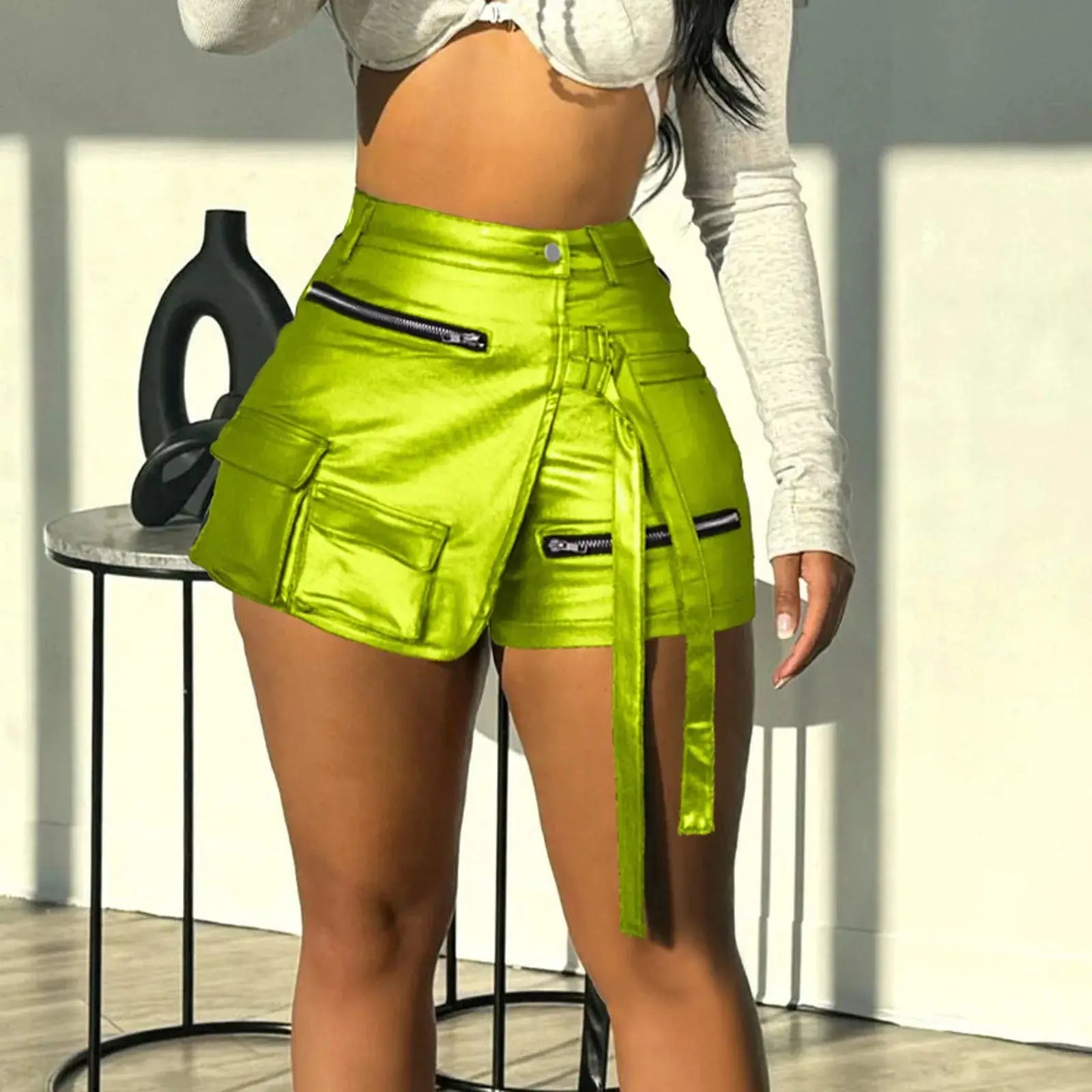 Women’s faux leather shorts, solid color slim fit design with side zipper and patchwork-style seams