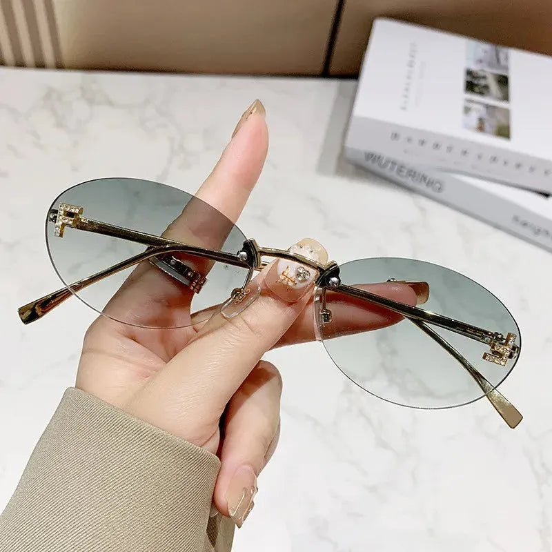 Rimless Oval Sunglasses with Diamond Accent F Letter Design