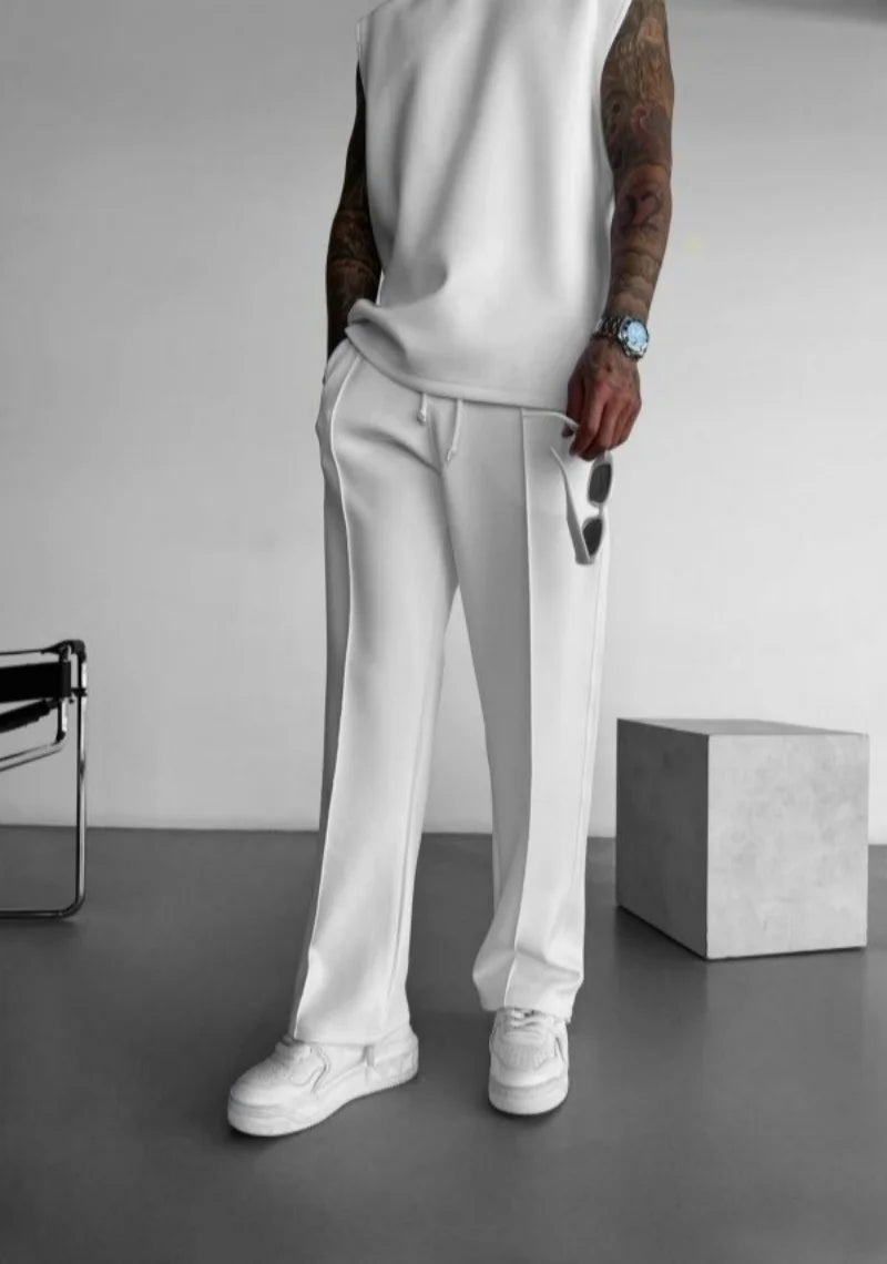 White men's casual pants with elastic waist and clean straight fit.