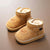 Tan winter plush boots for toddlers with bear design