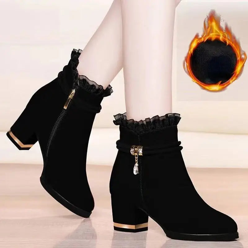 Women's black fashion boots with ruffle trim