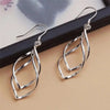 Silver long earrings with geometric design