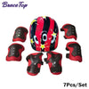 Red and black kids protective gear set with helmet and pads.