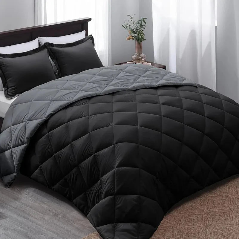 Gray and black reversible microfiber bedding comforter set with pillow shams, featuring a diamond quilted pattern and soft finish.