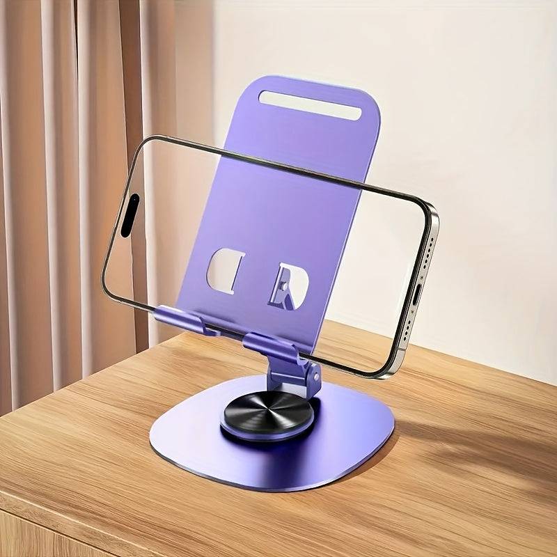 Metal desktop phone stand with 360° rotating base, foldable design, silicone pads, and mechanical click