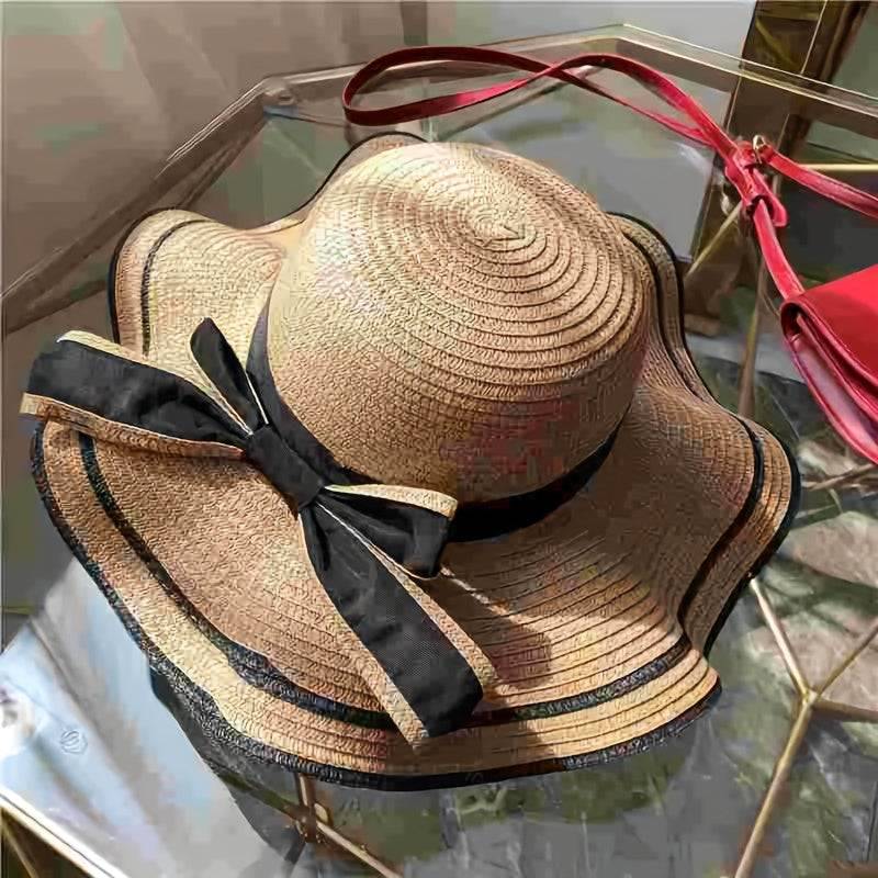 Women's summer beach sun hat with UV protection, wide brim straw-style hat with bow and flower, lightweight for travel